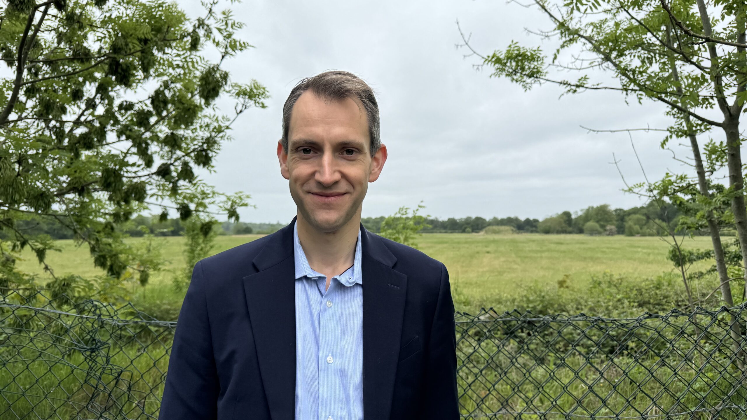 Andrew Lewin MP outside aerodrome site
